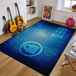 Puede incluir: Alfombra azul y negra con un patrón digital de un candado, placas de circuito y código binario. La alfombra tiene un fondo azul con un patrón de cuadrícula negra.