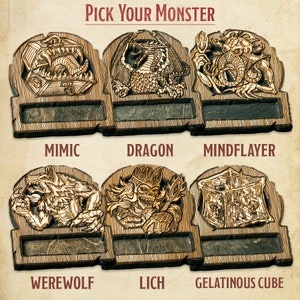 May include: Six wooden tokens featuring various monster illustrations and names. The tokens are labelled "Mimic", "Dragon", "Mindflayer", "Werewolf", "Lich", and "Gelatinous Cube".