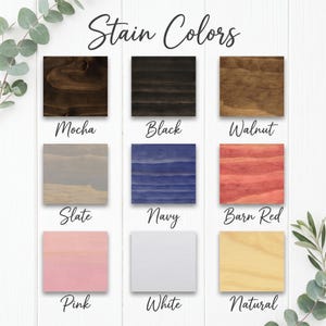 以下が含まれることがあります： Mocha、Black、Walnut、Slate、Navy、Barn Red、Pink、White、Naturalとラベル付けされた9つの正方形の木材ステインカラーサンプルのグリッド。サンプルは3行3列に配置され、さまざまな木目の質感と色を表示しています。