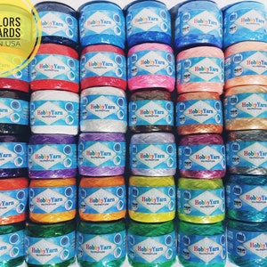 May include: 36 spools of Hobby Yarn in various colors, each spool containing 404 yards of polypropylene yarn. Made in the USA.