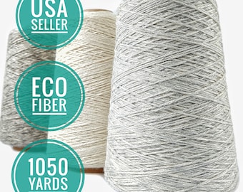 May include: Three spools of yarn, one grey, one white, and one beige. The spools are labelled "USA SELLER", "ECO FIBER", and "1050 YARDS".