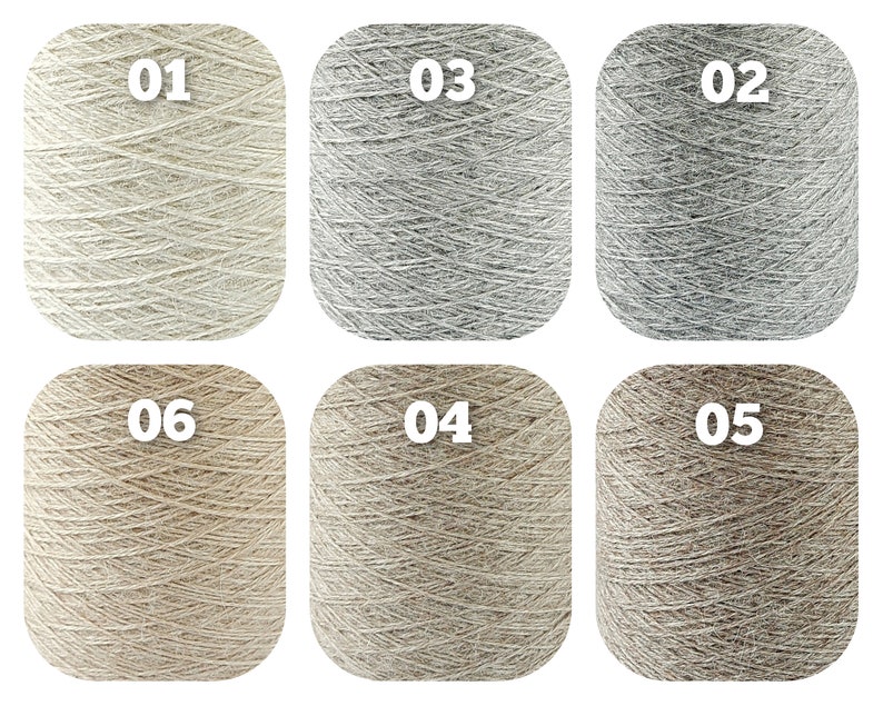 Pode incluir: Seis bobinas de fio dispostas em duas filas, cada uma rotulada com um n&uacute;mero branco. As cores incluem creme, cinza claro, cinza m&eacute;dio, bege claro, bege m&eacute;dio e bege escuro. Cada bobina apresenta uma apar&ecirc;ncia texturizada e fibrosa.