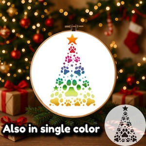 May include: A rainbow-colored Christmas tree design made of paw prints. The tree is surrounded by a white circle and a white background. The text "Also in single color" is at the bottom of the image.
