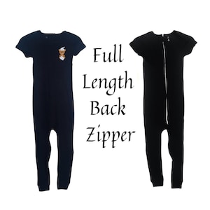 May include: Two black short-sleeved onesies with full-length back zippers. One onesie has a small brown bear applique on the front.
