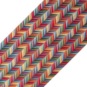 Runner da tavola a spina di pesce multicolore: decorazione etnica geometrica