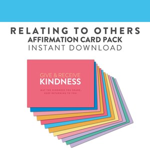 May include: A stack of colorful affirmation cards with the text "Give & Receive Kindness" and the message "May the kindness you share, keep returning to you."