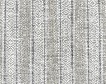 May include: A woven fabric featuring a repeating pattern of vertical stripes in shades of light gray and white. The design includes alternating bands of solid vertical lines and textured sections with a small diamond geometric motif throughout.