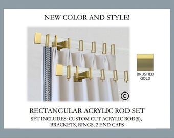 May include: A rectangular acrylic rod set with brushed gold hardware. The set includes custom cut acrylic rods, brackets, rectangular rings, and two end caps. Text on the image reads: NEW COLOR AND STYLE!, BRUSHED GOLD, RECTANGULAR ACRYLIC ROD SET.