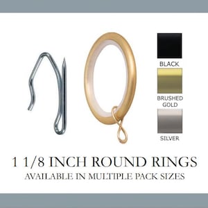 May include: A display of curtain rings and hooks. The image shows a silver hook, a gold-colored ring, and color swatches for black, brushed gold, and silver. Text reads "1 1/8 inch round rings available in multiple pack sizes."