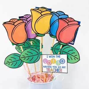 Repurpose a wire photo holder to display lottery tickets! A nice twist to  the typical basket or bouquet …