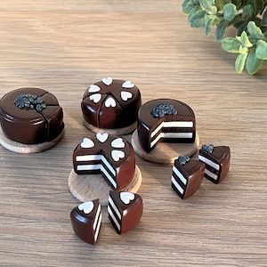 Miniature chocolate cake. Realistic doll food. Scale 1:12