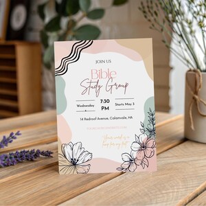 May include: A rectangular invitation card with the text "Bible Study Group" in a script font. The card has a soft colour palette with floral illustrations and the text "Join Us". The time and location are also included.