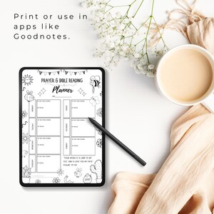 May include: A black and white printable planner for prayer and bible reading. The planner has a weekly layout with space for daily bible reading, prayer, and notes. The planner is decorated with cute bee and flower illustrations. The text "Your word is a lamp to my feet, and a light for my path" is included on the planner.