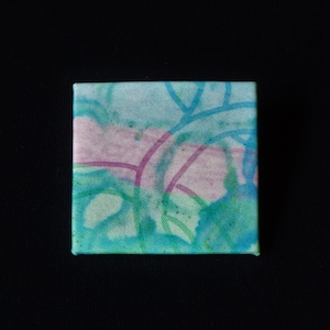 Handmade and hand printed square fabric brooches