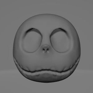 Può includere: Una scultura sferica grigia del volto di un personaggio con grandi orbite ovali, un piccolo naso e una bocca cucita. Il volto ha una superficie leggermente strutturata ed è ambientato su uno sfondo grigio. Il volto del personaggio è tratto dal film "Nightmare Before Christmas".