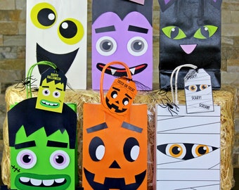 8 Designs Halloween Trick or Treat Goody Gags Gift Bag Party Favor Candy Cookie Bags Kraft Paper Gift Bags with Halloween Atmosphere Cartoon Stickers 48 Pcs Halloween Treat Bags & Sealing Sticker 8 Designs Halloween Trick or Treat Goody Gags Gift Bag Party Favor Candy Cookie Bags Kraft Paper Gift Bags with Halloween Atmosphere Cartoon Stickers 48 Pcs Halloween Treat Bags & Sealing Sticker