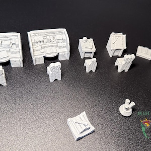 May include: A set of miniature white painted furniture pieces, including two desks, chairs, a bookshelf, and a small table. The pieces are made of a textured material and have a rustic look.