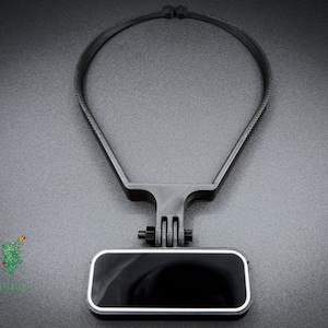 May include: Black plastic headband with a black camera mount attached. The camera mount has a rectangular black camera attached to it.