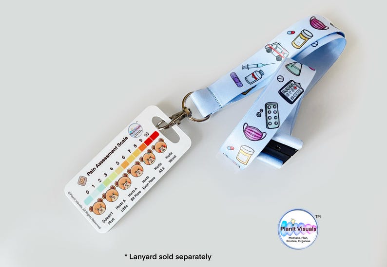 May include: White card with a pain assessment scale featuring a row of cartoon bears with different facial expressions. The scale ranges from 0 to 10. The card is attached to a light blue lanyard with a medical theme. The lanyard has a variety of medical symbols printed on it, including pills, a syringe, a thermometer, and a face mask.