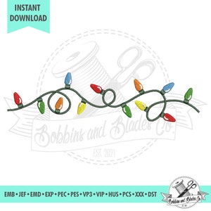 May include: A string of colorful Christmas lights with green wire, perfect for embroidery projects. The lights are in red, orange, yellow, green, blue, and light blue. The image includes the text "Bobbins and Blades Co. EST. 2021".