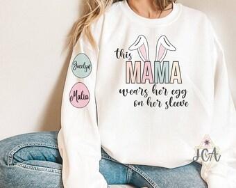 Custom Easter Mama Sweatshirt With Kids Names, This Mama Wears Her Eggs On Her Sleeve Crewneck Sweatshirt, Mama Easter Sweatshirt