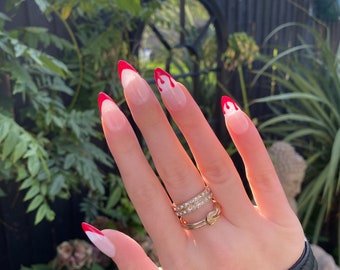 Almond shape, red, press-on nails - with drippy blood red & French tip design.