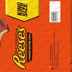 May include: A bright orange Reese's King Size milk chocolate peanut butter cups candy wrapper featuring a yellow banner with black text, a barcode, and a graphic of a chocolate peanut butter cup with a bite taken out of the side.