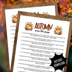 May include: A printable game card with an autumn theme. The card features a title that says "Autumn Pass the Prize" and instructions for a game. The card is decorated with fall leaves, pumpkins, and flowers.