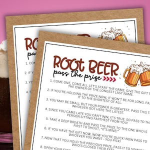 May include: A brown and white card with the text "Root Beer Pass the Prize" in brown lettering. The card features a cartoon illustration of two mugs of root beer. The text on the card includes instructions for a game.