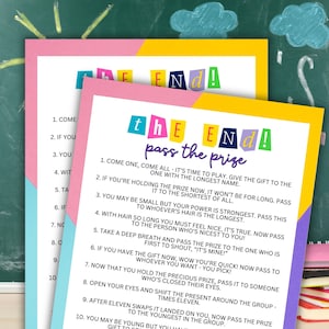 May include: A pink and yellow printable game card with the text "The End! Pass the Prize" and instructions for a game. The instructions include passing a gift to the person with the longest name, the shortest person, the person with the longest hair, the nicest person, and the first to shout "It's mine!"