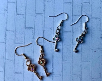 Rose gold or silver key earrings.