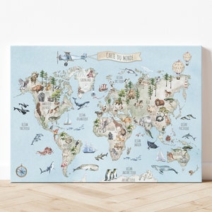 May include: A blue and white world map with animals and text in French. The map includes the text "Carte du Monde" and shows the continents of North America, South America, Europe, Asia, Africa, Australia, and Antarctica. The map is surrounded by a light blue border.