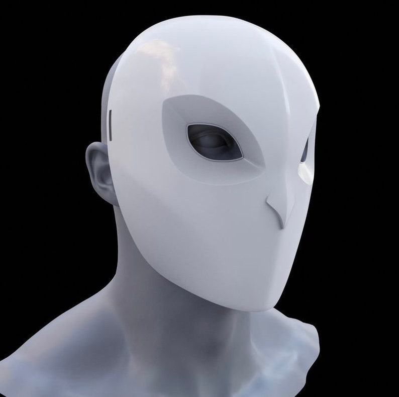 May include: A white owl-shaped mask with a smooth, glossy finish. The mask has large, oval eye openings and a pointed beak. The mask is designed to fit over the face. The mask is worn by a mannequin head.