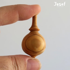 Tiny Olive Wood Spinning Top: Handmade Miniature Toy