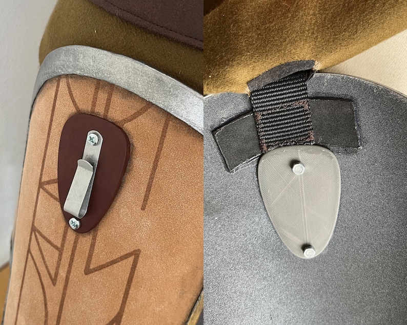 May include: Close-up of two brown leather straps with metal buckles and a gray metal plate with two screws. The straps are attached to a brown leather surface.