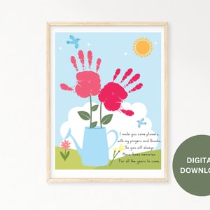May include: A printable art print featuring a blue watering can and two pink handprint flowers. The print includes a poem that reads "I made you some flowers with my fingers and thumbs. So you will always have these memories. For all the years to come."