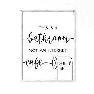 May include: Black and white sign with the text "This is a bathroom, not an internet cafe" and a toilet paper roll with the text "Shit & Split" on it.