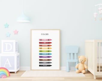 May include: A colorful educational poster for children featuring the word "COLORS" at the top and a row of crayons in different colors with their names listed below each crayon. The colors are pink, red, orange, yellow, green, blue, purple, brown, gray, and black.
