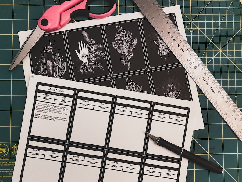 May include: A printable sheet of paper with a black and white illustration of a hand with an eye on the palm. The sheet is labeled "Magic Missile" and has a table with the headings "Casting Time", "Range", "Components", "Duration", and "School".