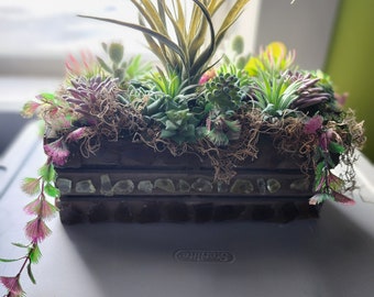 Faux succulent driftwood planter. This baby shines in the sun and is stuffed with goodies from every angle! 12" x 12" x 5"