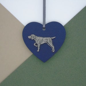 May include: A blue heart-shaped wooden ornament with a silver-colored German Shorthaired Pointer dog silhouette.