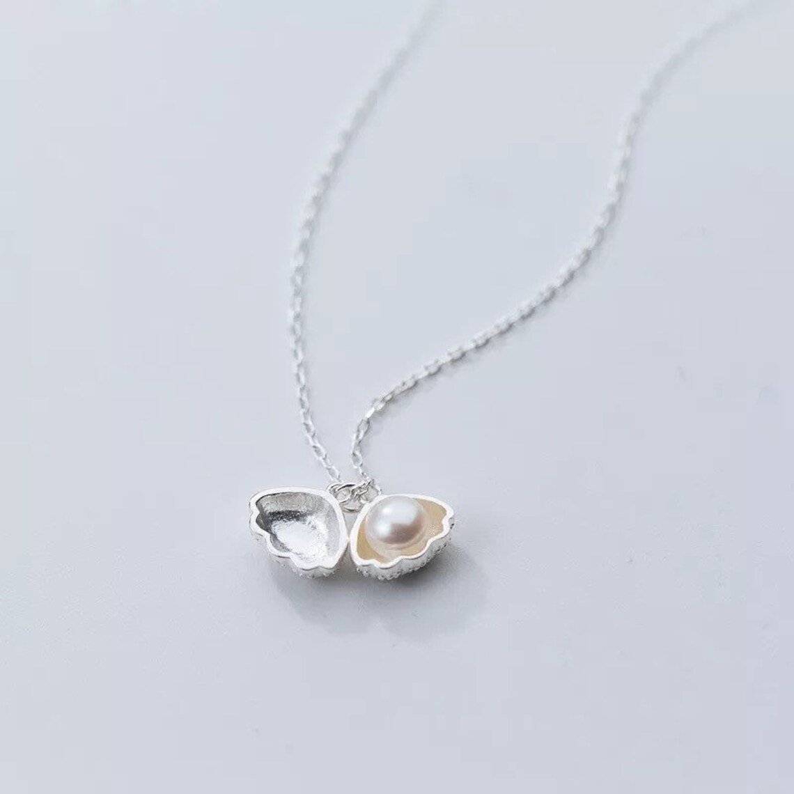 Collar de perlas de concha de