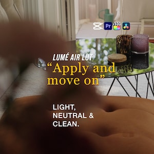 Può includere: Un tavolo a specchio espone oggetti decorativi, tra cui due contenitori di vetro a fantasia e un piccolo oggetto rotondo. Il testo "LUMÉ AIR LUT" e "Apply and move on" è visibile. Sono presenti anche le parole "LIGHT, NEUTRAL & CLEAN".