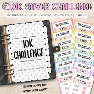May include: A black binder with gold rings and a white dotted page that says "10K CHALLENGE". Several colorful cards with amounts in Euros are displayed, promoting a savings challenge. The text "Saving money has never been easier!" is also visible.