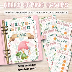 May include: A pink planner with the text "HELLO SPRING SAVERS" and "HELLO SPRING £500". The planner includes savings trackers with floral designs and a gnome illustration. The text "Saving money has never been easier!" is also visible.