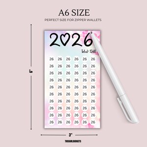 May include: A6 size budgeting tracker with the year 2026 and a total of 1560. The card is 6 inches tall and 3 inches wide, with a pastel background and a white pen. The card is designed to fit in zipper wallets.