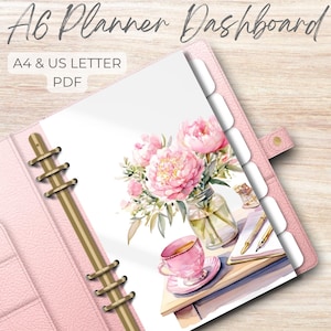 May include: Pink A6 planner dashboard with gold accents. The planner features a watercolor illustration of pink peonies in a vase, a teacup, and a notepad. Text on the planner reads "A6 Planner Dashboard" and "A4 & US LETTER PDF".