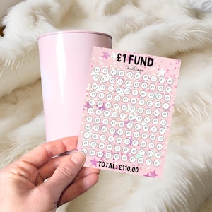 May include: A pink and white printable chart with a pink background and white stars. The chart is titled "£1 FUND Challenge" and has 110 circles with the symbol "£1" inside each circle. The total amount is listed as "TOTAL: £110.00".