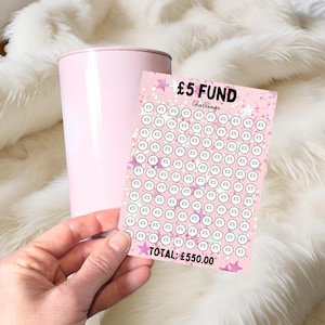 May include: A pink and white printable chart with a pink background and white stars. The chart is titled "£5 FUND Challenge" and has 110 circles with the text "£5" inside each circle. The total amount is £550.00.