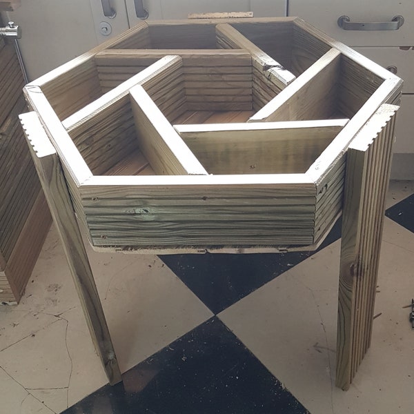 Beautiful handmade raised hexagonal herb wheel planter veg bed made from tanalised fsc timber.